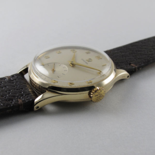 Gold Omega Ref. 920 vintage wristwatch, hallmarked 1954