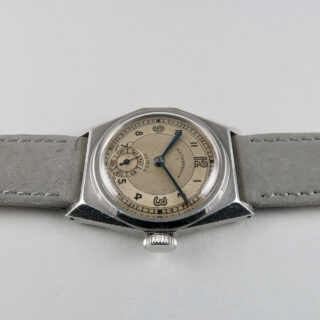 Dimra with Taubert Fils case circa 1940 | steel hand wound vintage wristwatch